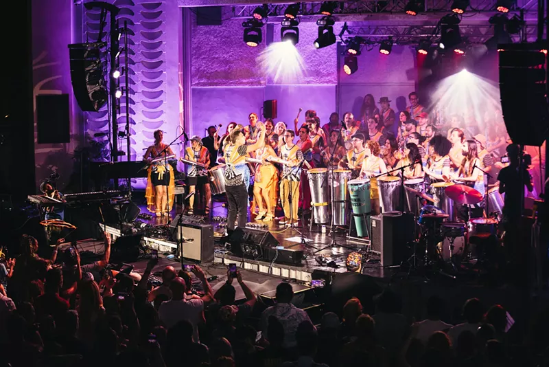 Image: a percussion ensemble performs on stage at the Miami Beach Bandshell