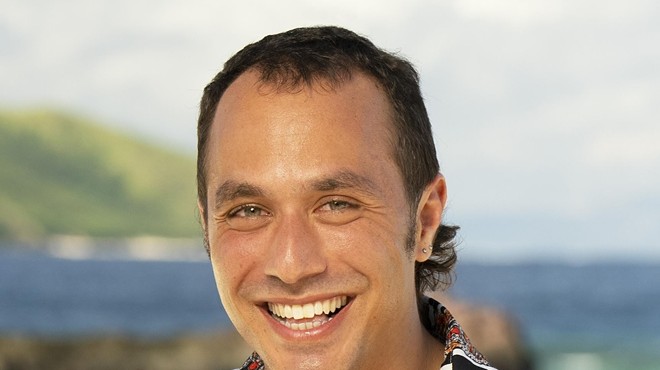 Ben Katzman's portrait of him smiling in a striped shirt