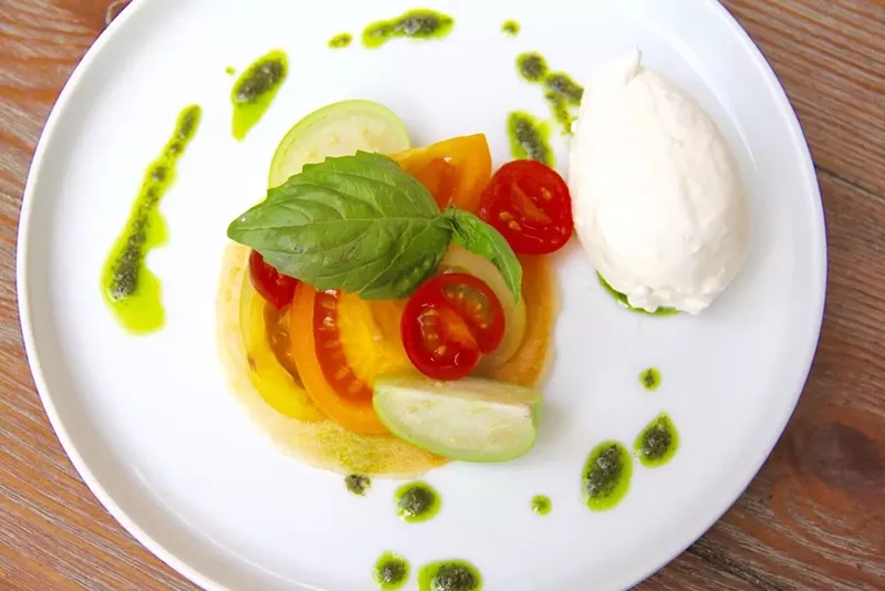 Image: Villa Azur's tomato tart with cherry tomatoes from Bonita Springs and burrata from Fort Lauderdale, offered on the restaurant's "All From Florida" menu.