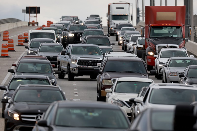 Vehicles drive along I-395 on March 15, 2023 in Miami, Florida. As more people move to the Miami area, traffic gridlock is a source of frustration for drivers.