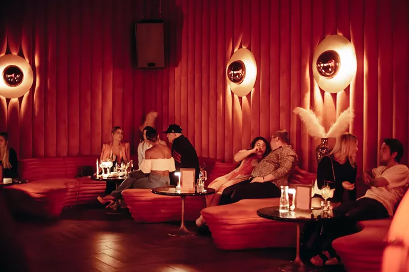 Image: Good vibes and speakeasy coziness abound at Monsieur Guille Wine Room.