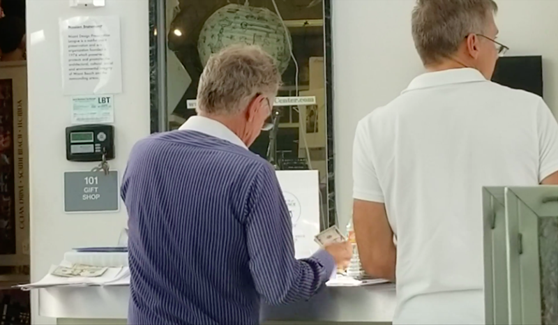 Political consultant Randy Hilliard, left, was filmed paper-clipping $50 bills onto new member applications for the Miami Design Preservation League. MDPL Director Daniel Ciraldo says Hilliard was attempting to buy this week's board election.