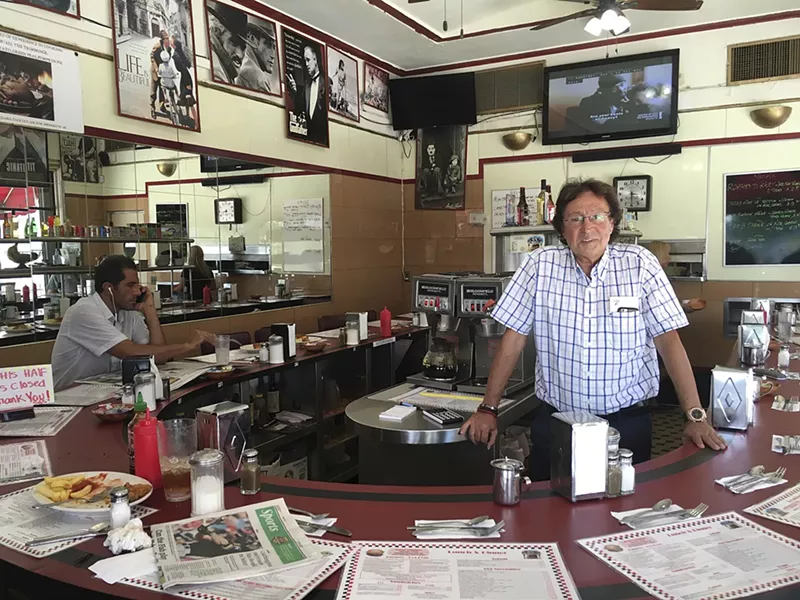 Image: Owner Simon Elbaz at the old location.
