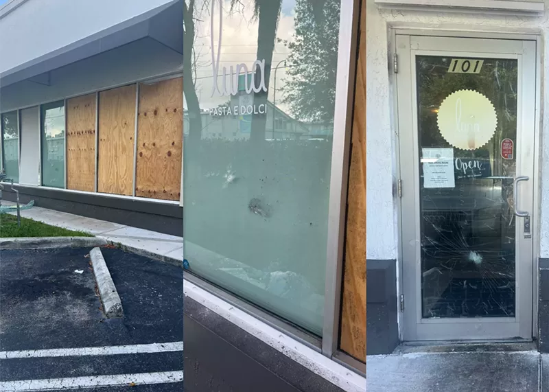 Image: a restaurant with damage to glass storefront