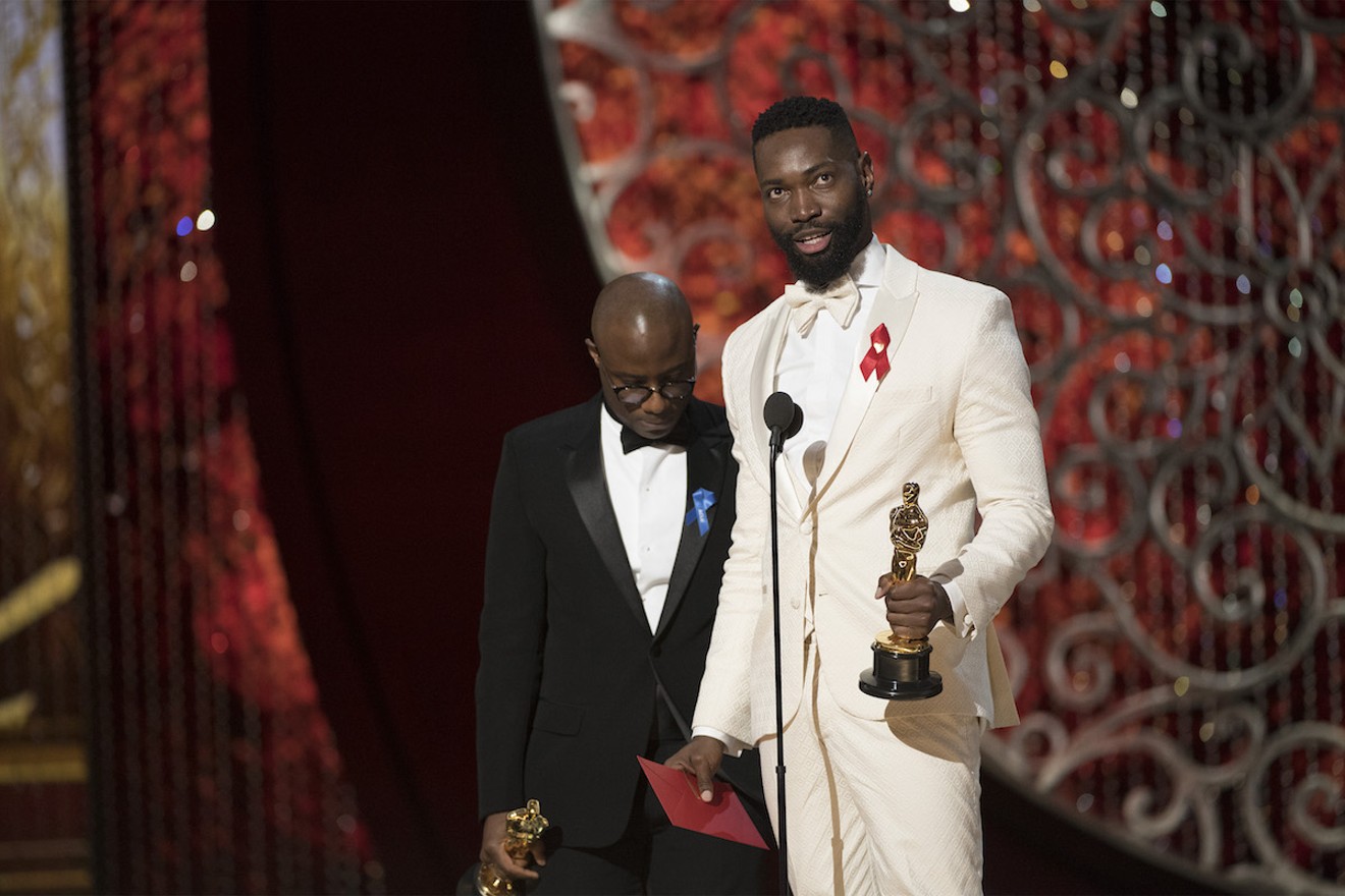 Barry Jenkins and Tarell Alvin McCraney on the Oscars stage.