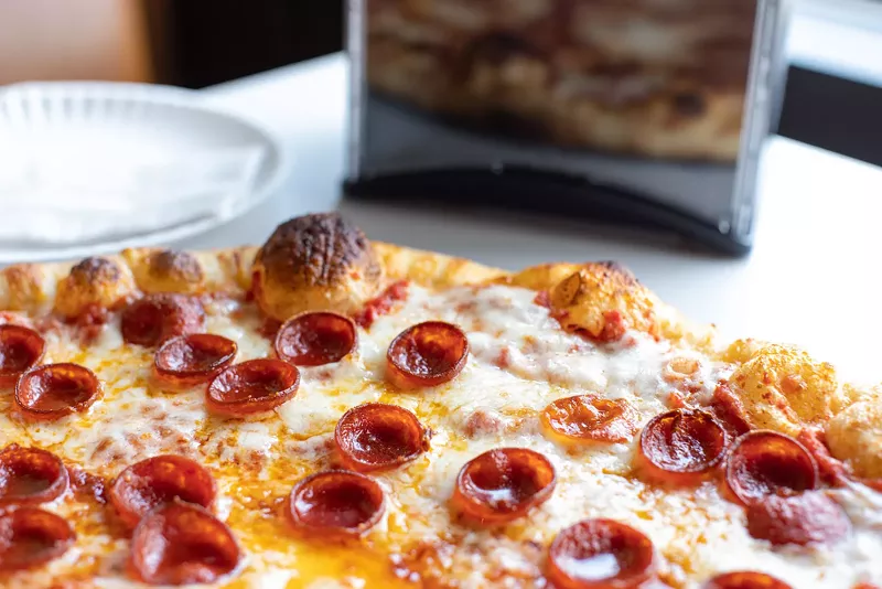 Image: Pizza by the slice is the name of the game at Far Out Pizza.