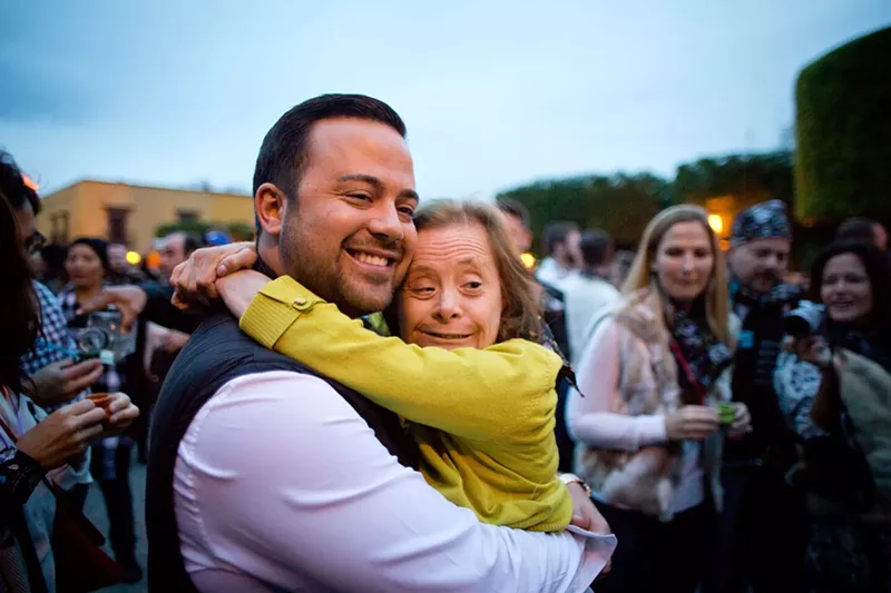 Image: Pilo's Street Tacos owner Derek Gonzalez with his aunt, Pilo, who inspired his mission to empower and employ people with "special abilities," including Down syndrome.