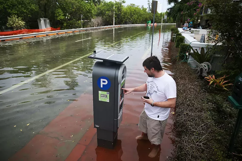 Image: A king tide is no excuse not to pay for parking in Miami Beach.