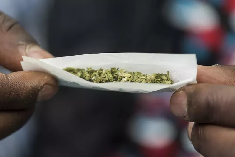 Image: Under the new bill, a person caught with 20 grams or less of weed would be charged with a noncriminal violation.