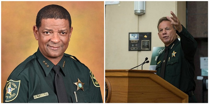 Adderley, at left, briefly stayed on after Sheriff Scott Israel was removed.