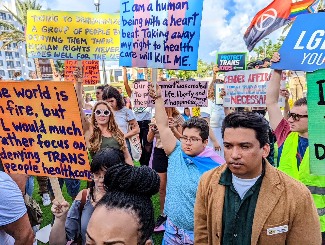 Protesters gather outside the Marriott Fort Lauderdale Airport hotel where the Florida Board of Medicine held a meeting on August 5, 2022, to consider proposed rules to ban gender-affirming medical care for minors.