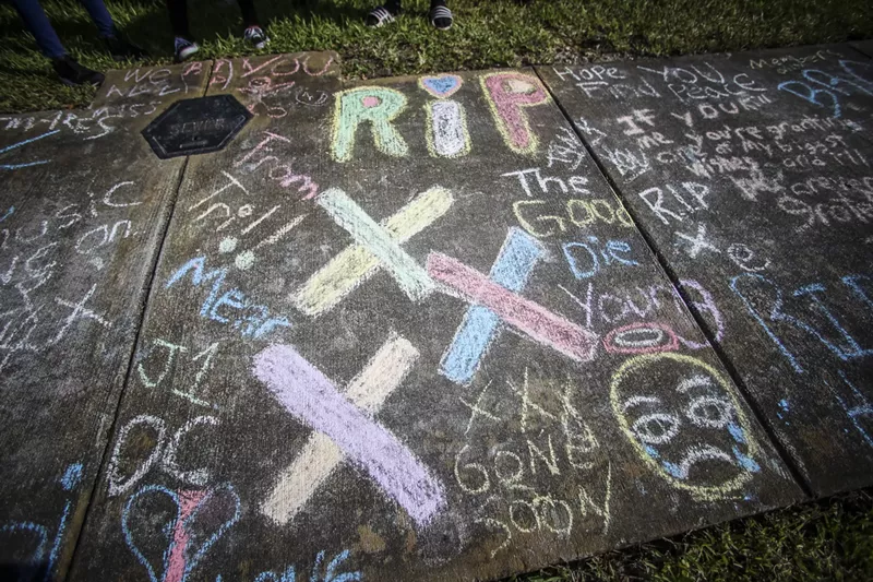 Image: A fan tribute to XXXTentacion left at the site of his murder in June 2018