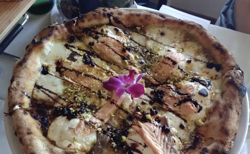 Image: Nightly Pizza Acrobatics at Normandy Isle's Capri New Style