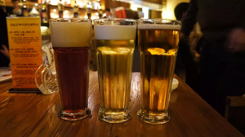 Image: Craft beer at the Taedonggang Microbrewery #3, which is described as the "trendiest" bar in Pyongyang, North Korea.