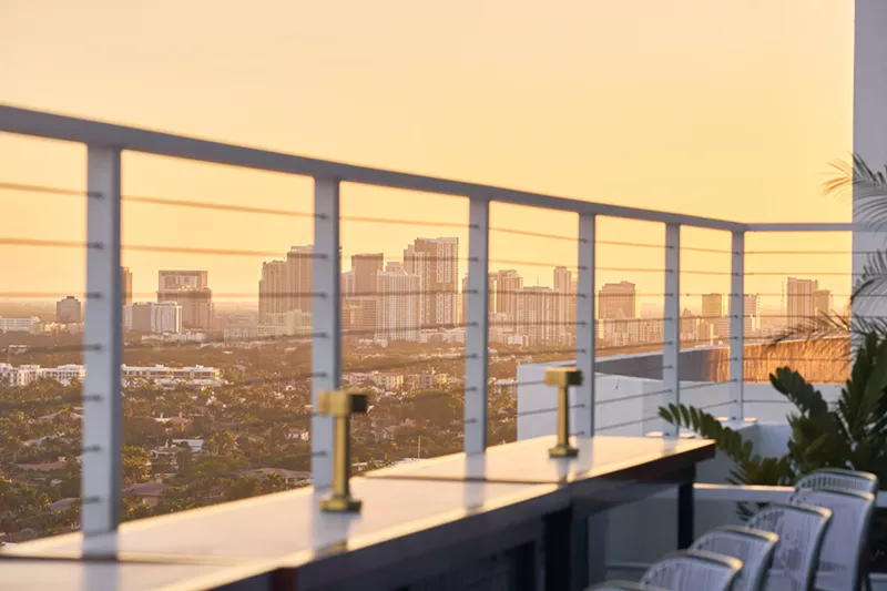 Image: A balcony with tables
