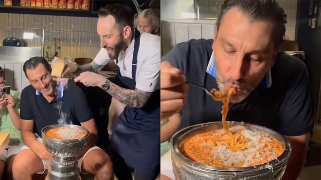 Hall of Fame goaltender and former Panthers star Roberto Luongo eating pasta out of the Stanley Cup.