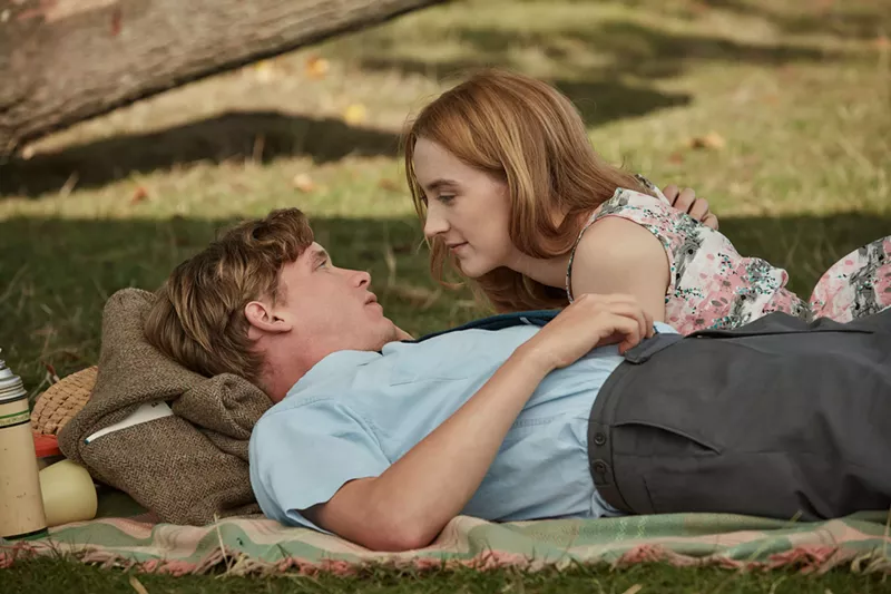 Image: Billy Howle (left) and Saoirse Ronan play young newlyweds very much in love with but still painfully awkward around each other during their wan honeymoon in Dominic Cooke’s On Chesil Beach.