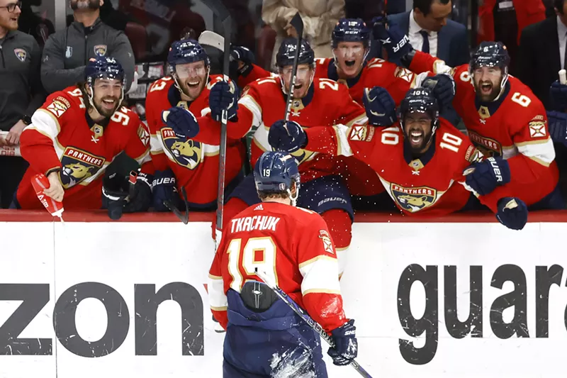 Image: Matthew Tkachuk of the Florida Panthers celebrates with his teammates after scoring the game-winning goal against the Carolina Hurricanes in Game 4 of the Eastern Conference Finals on May 24, 2023 in Sunrise, Florida.