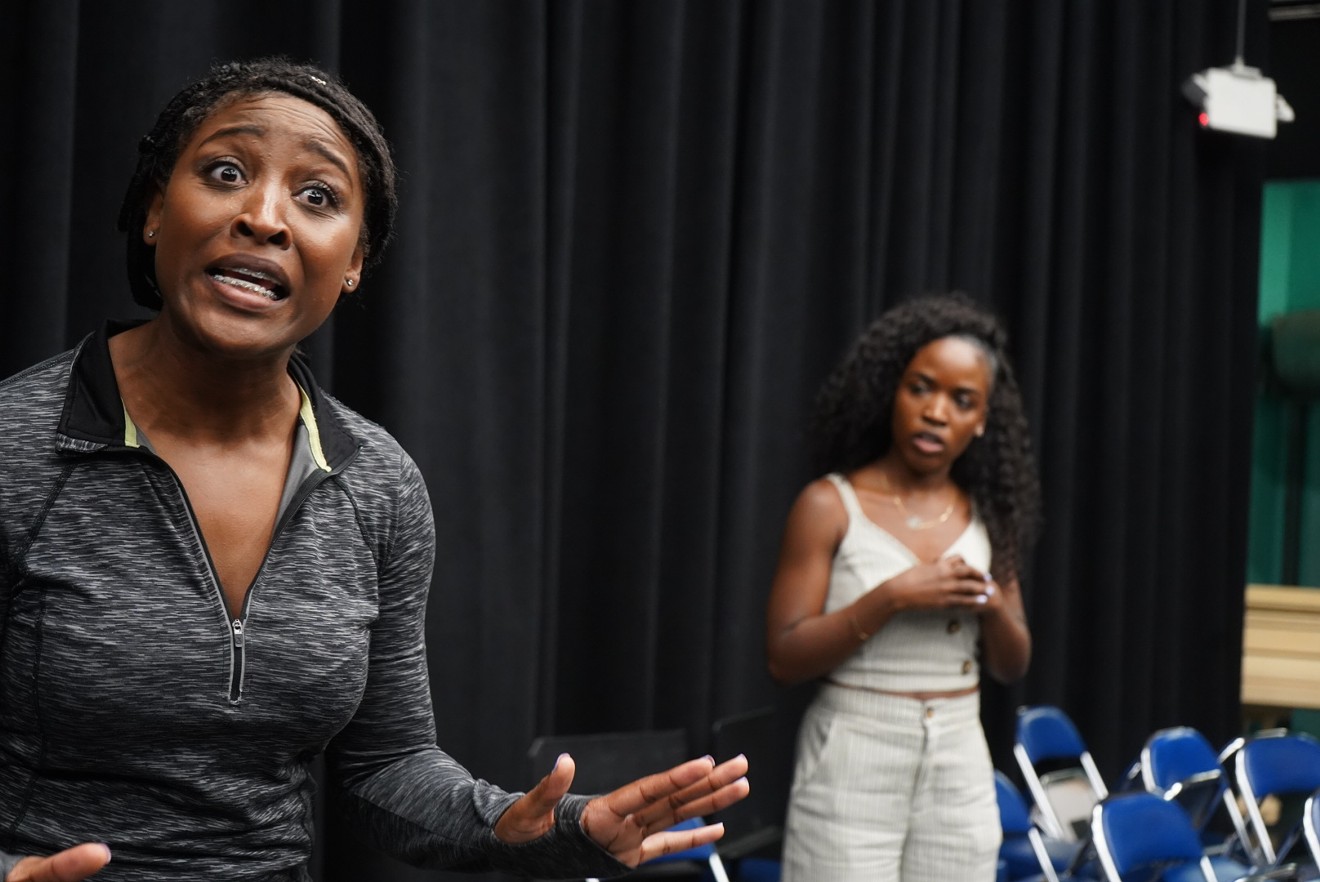Trittney Huzzie (left) and Khadijah Rolle rehearse a scene from Pretty Fire.
