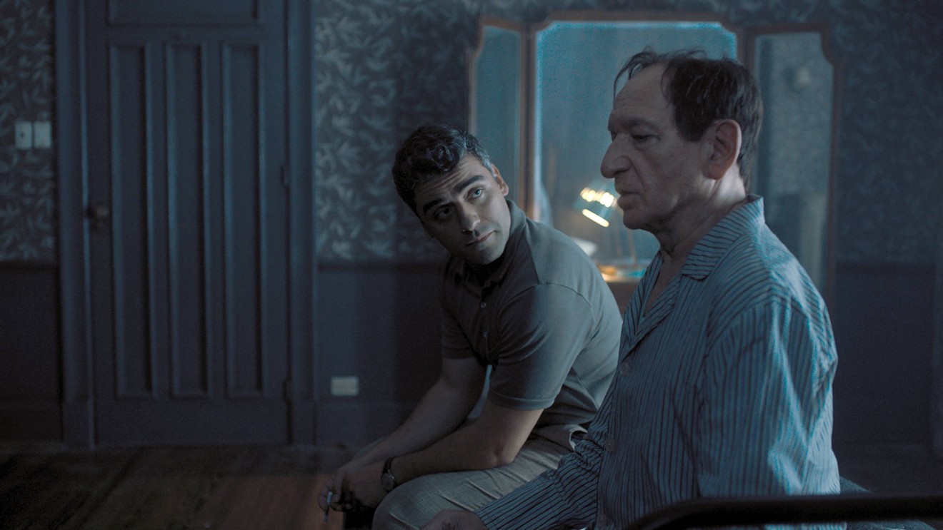 Oscar Isaac (left) plays Peter Malkin, the Mossad agent in charge of the mission to catch Final Solution "architect" Adolf Eichmann (Ben Kingsley), in Chris Weitz’s caper-thriller Operation Finale.