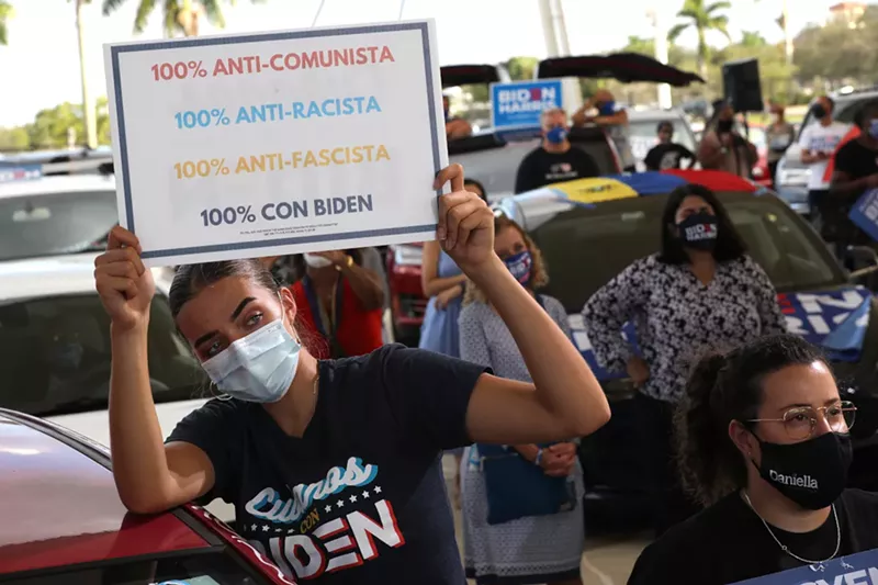 Image: Biden supporters gather at a drive-in voter mobilization event at Miramar Regional Park in October 2020.