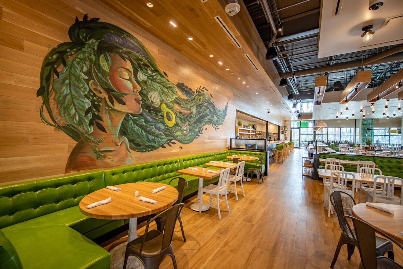 A mural by Cinthia Santos adorns a wall at True Food Kitchen’s new Miami location.