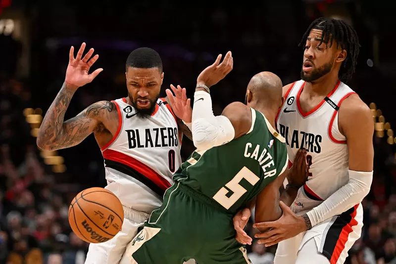 Image: Say it ain't so, Antetokounmpo! Damian Lillard (pictured left) is heading to the Milwaukee Bucks instead of his dream destination in Miami.