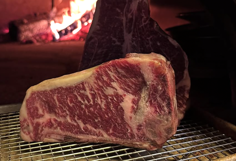 Image: steak by open flame