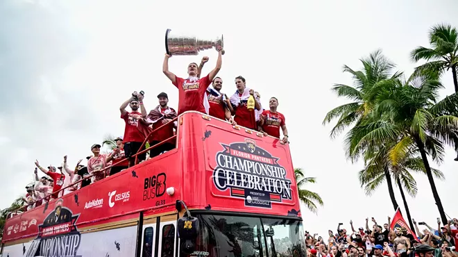 Hockey players celebrate a Stanley Cup Finals win.