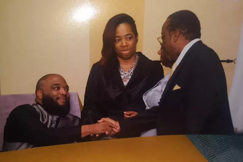 Image: Anthony Swain (left) in an undated family photo.