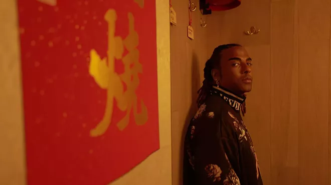 Portrait of musician Yotuel looking at the camera