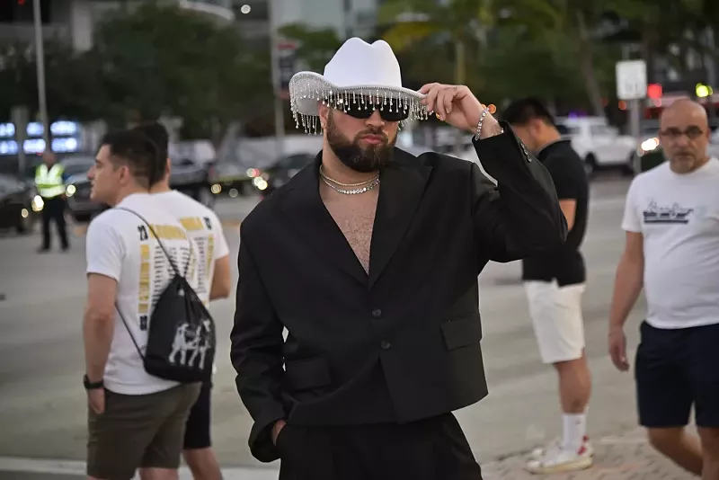 Image: Madonna fan in a cowboy hat and dressed in black