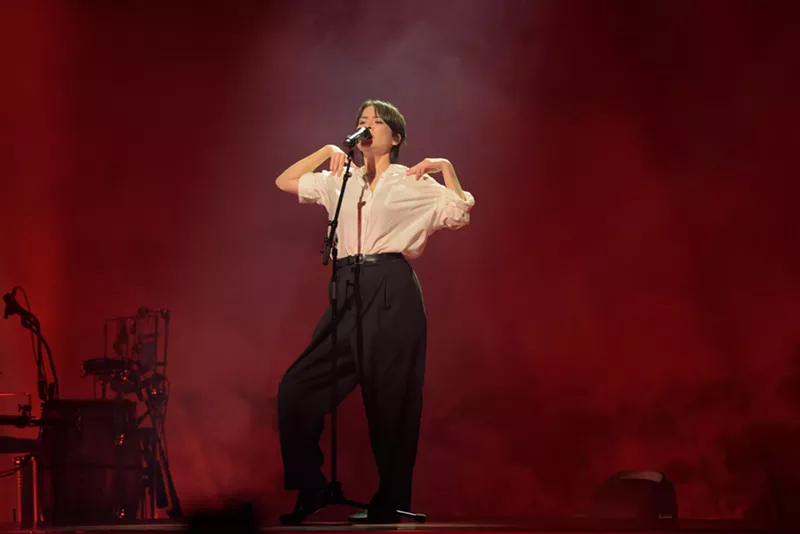 Image: Mitski performing on stage