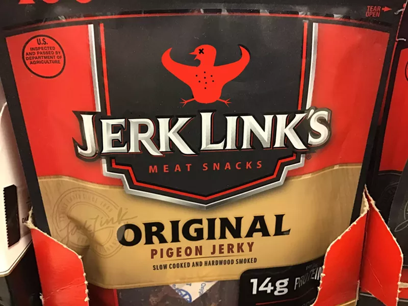 Image: What at first appears to be a Jack Link's original-flavor beef jerky packet is, upon closer inspection, labeled "Jerk Link's Pigeon Jerky," with the Jack Link's stylized longhorn logo replaced by a figure of a dead bird with wings spread to mimic the longhorn horns