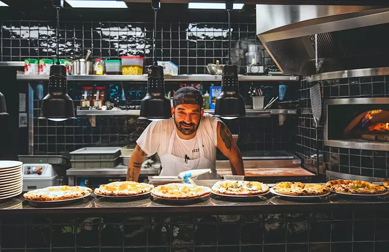 Image: PizzElla chef/owner Larry Galper mans the counter at Time Out Market in Miami Beach.