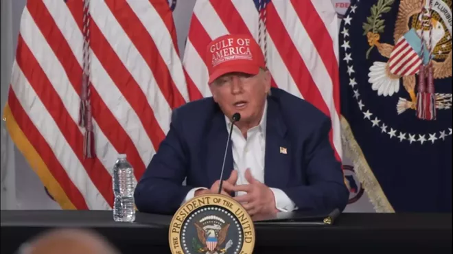 President Donald Trump addresses reporters in the Florida Everglades.