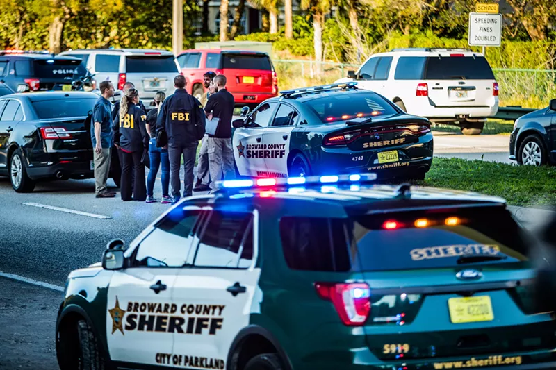 Image: Police respond to the mass shooting at Marjory Stoneman Douglas High School in Parkland in February 2018.