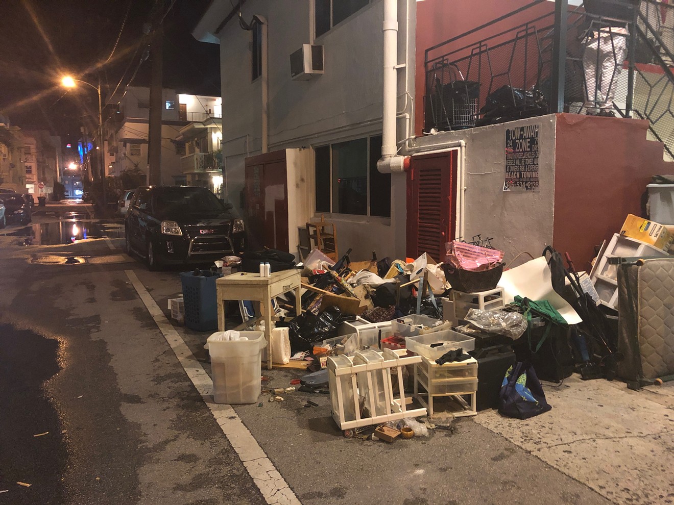 Maria Cazañes was evicted Friday night in South Beach. Her belongings were thrown into the alley behind her apartment on Euclid Avenue.