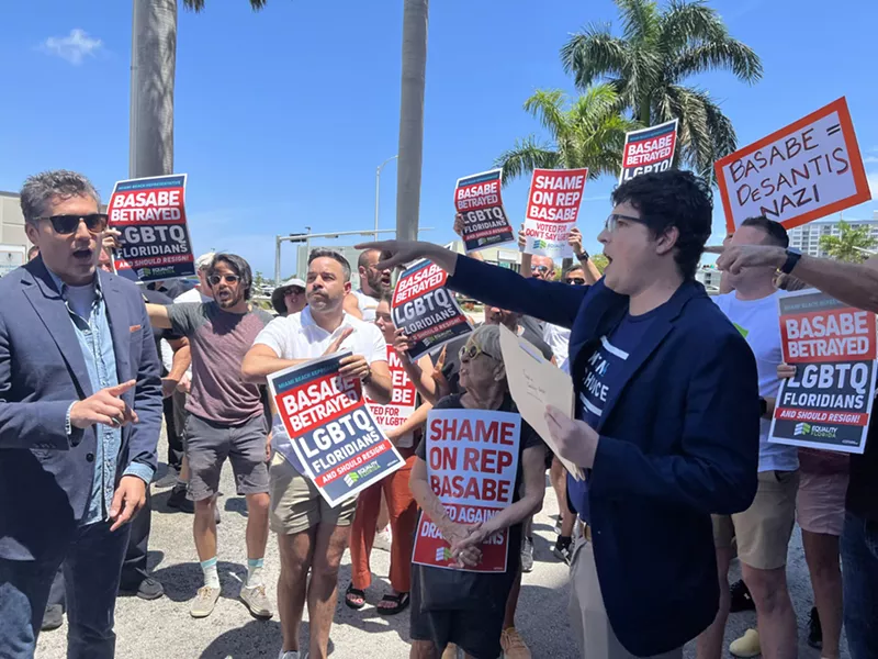 Image: Protester Aaron Bos-Lun points at Rep. Fabian Basabe at an April 14, 2023, gathering to oppose Basabe's votes on LGBTQ bills.