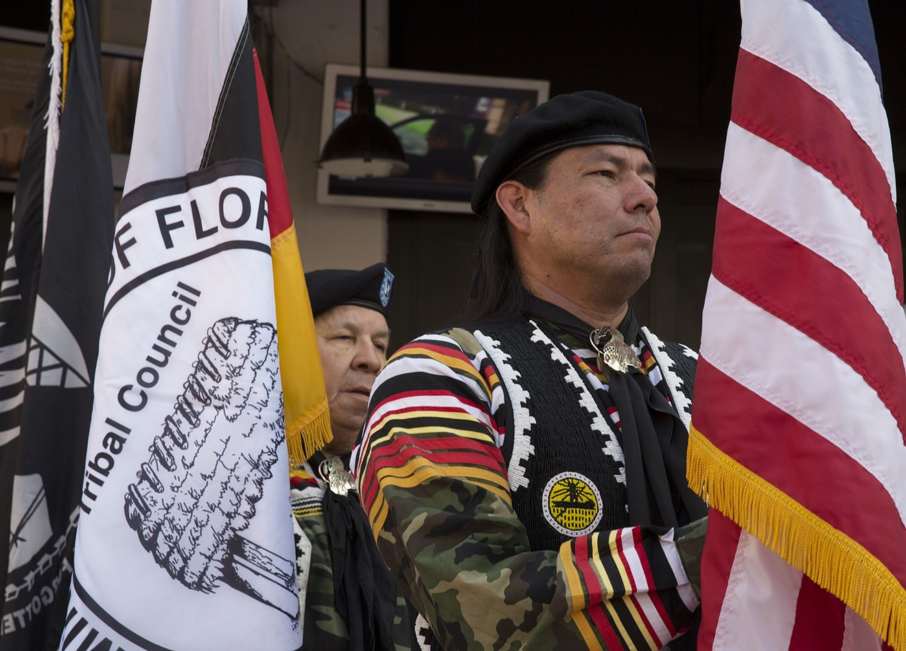The Seminole Tribe of Florida Color Guardsmen wait to present the colors during a welcoming party in 2014.