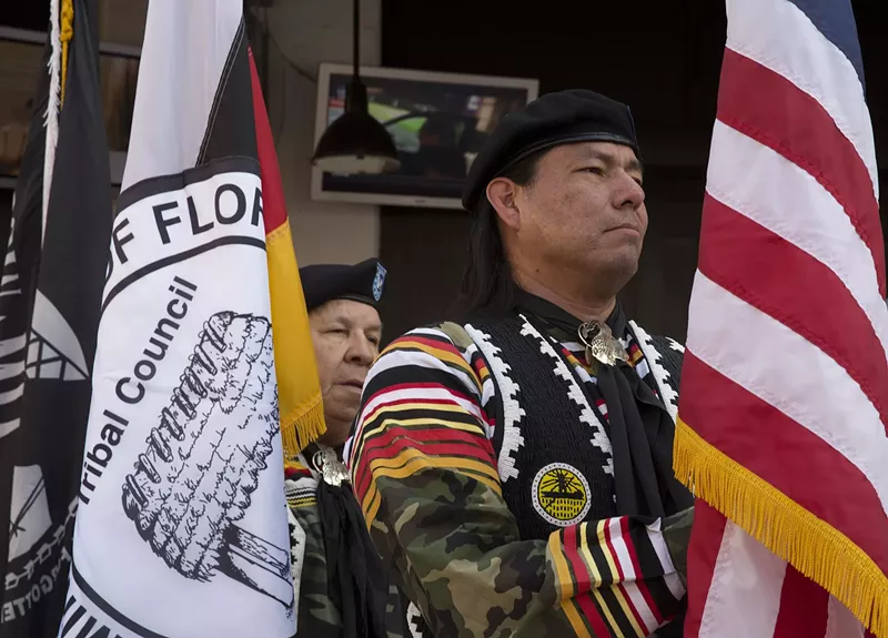 Image: The Seminole Tribe of Florida Color Guardsmen wait to present the colors during a welcoming party in 2014.