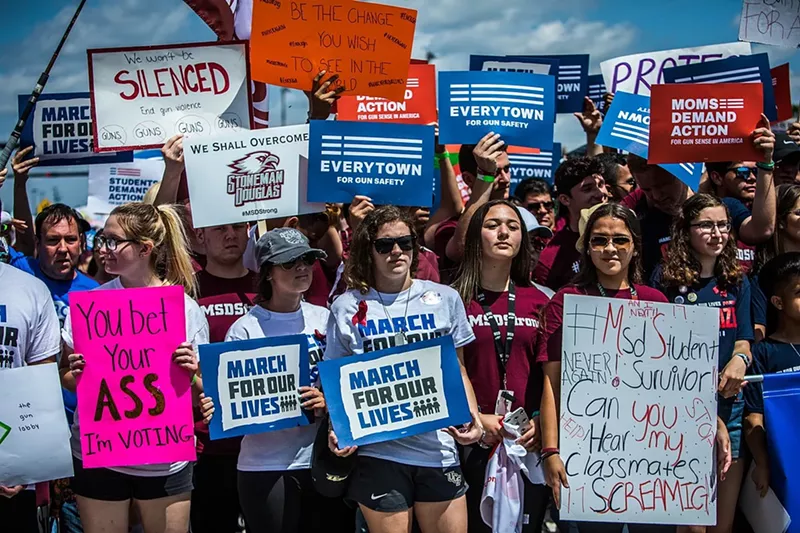 Image: Protesters with March for Our Lives, Moms Demand Action, and Everytown at a Parkland rally in 2018.