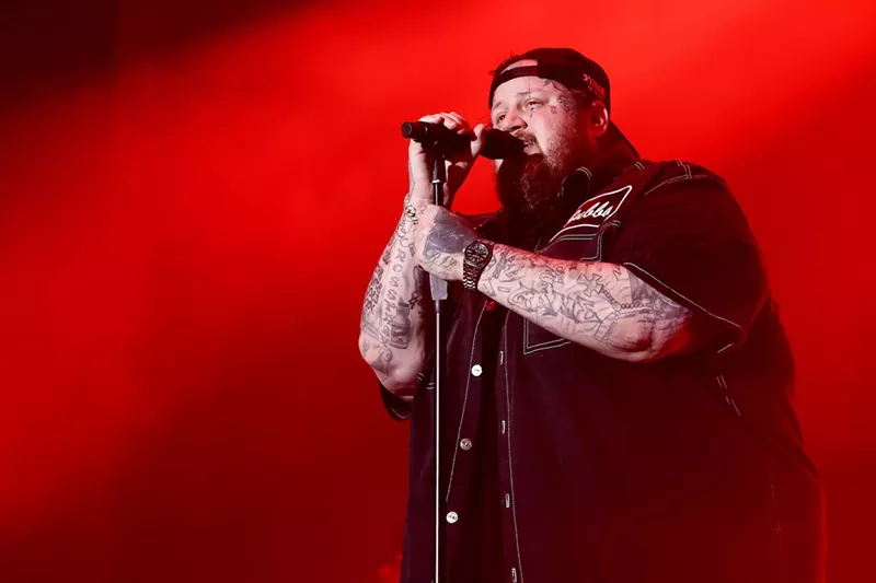 Image: Country singer Jelly Roll singing on stage at the Riptide Music Festival in Fort Lauderdale Beach
