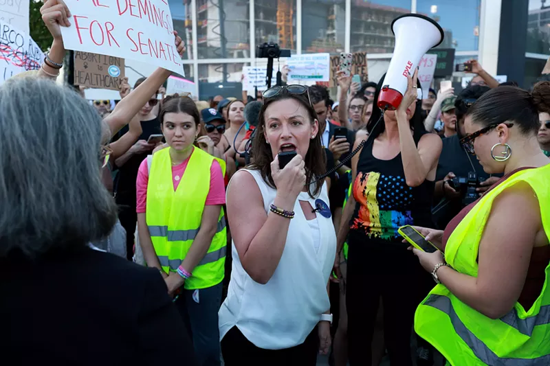 Image: Florida Agricultural Commissioner Nikki Fried joins a Miami protest after the Supreme Court's decision in Dobbs v. Jackson Women's Health on June 24, 2022.