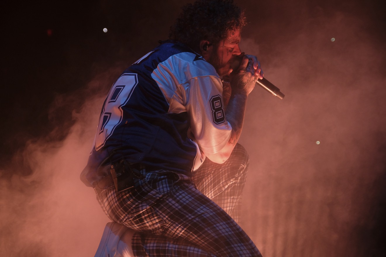 Post Malone onstage at the American Airlines Arena.