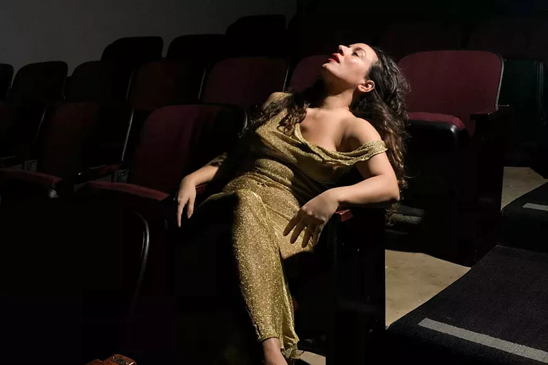 Image: Rosie Herrera slum in a theater seat
