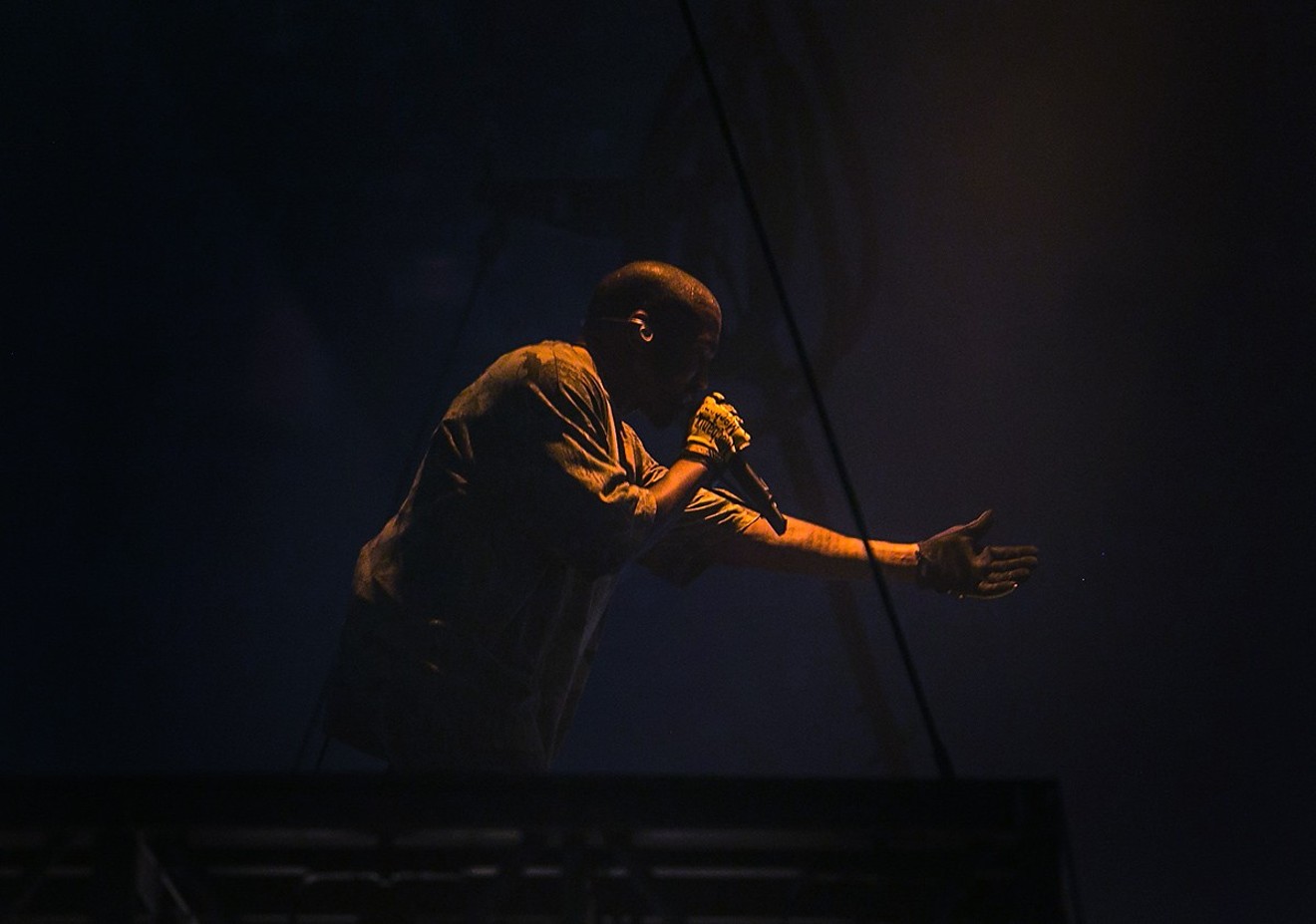 Kanye West performing at the American Airlines Arena during the 2016 Saint Pablo Tour.