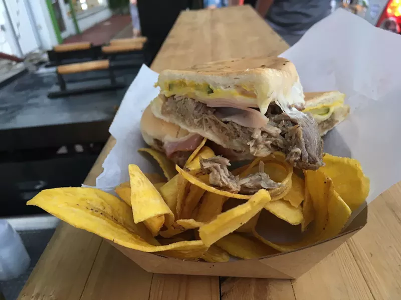 Image: Sanguich de Miami's Cuban sandwich and mariquitas.