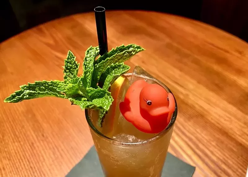 Image: Phuc Yea's "Lady Fu," made with black tea-infused Courvoisier VSOP, sweet vermouth, lychee, lemon, Thai basil, mint, and lime soda.