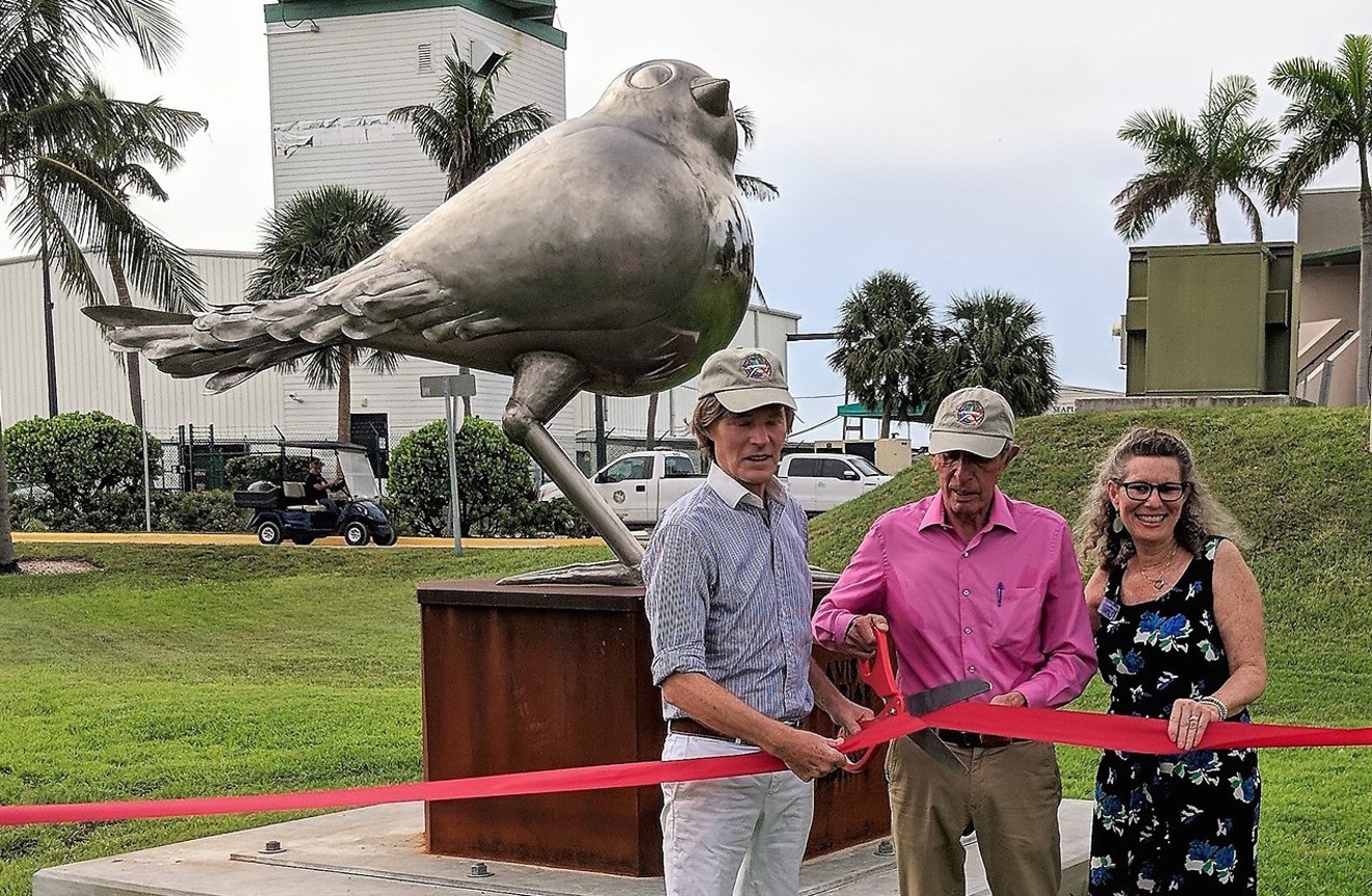 Philanthropists Jacob Dekker and John Padget join Liz Young of the Florida Keys Council of the Arts for a recent sculpture unveiling at Key West International Airport.